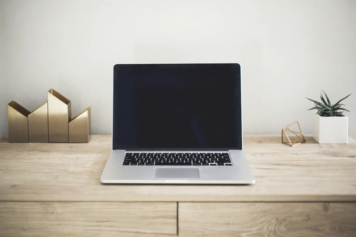 Laptop on a bright, minimal desk